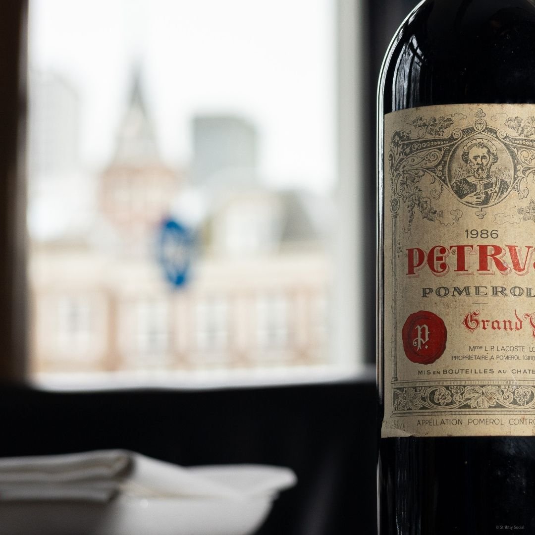 Petrus, the legend of the vine 🍇✨. 

Nestled in Pomerol's unclassified yet esteemed lands, Petrus shines as a Bordeaux beacon. With 11.5 hectares of ancient black clay and iron, predominantly Merlot vines averaging 40 years, yield a mere 35,000 bott