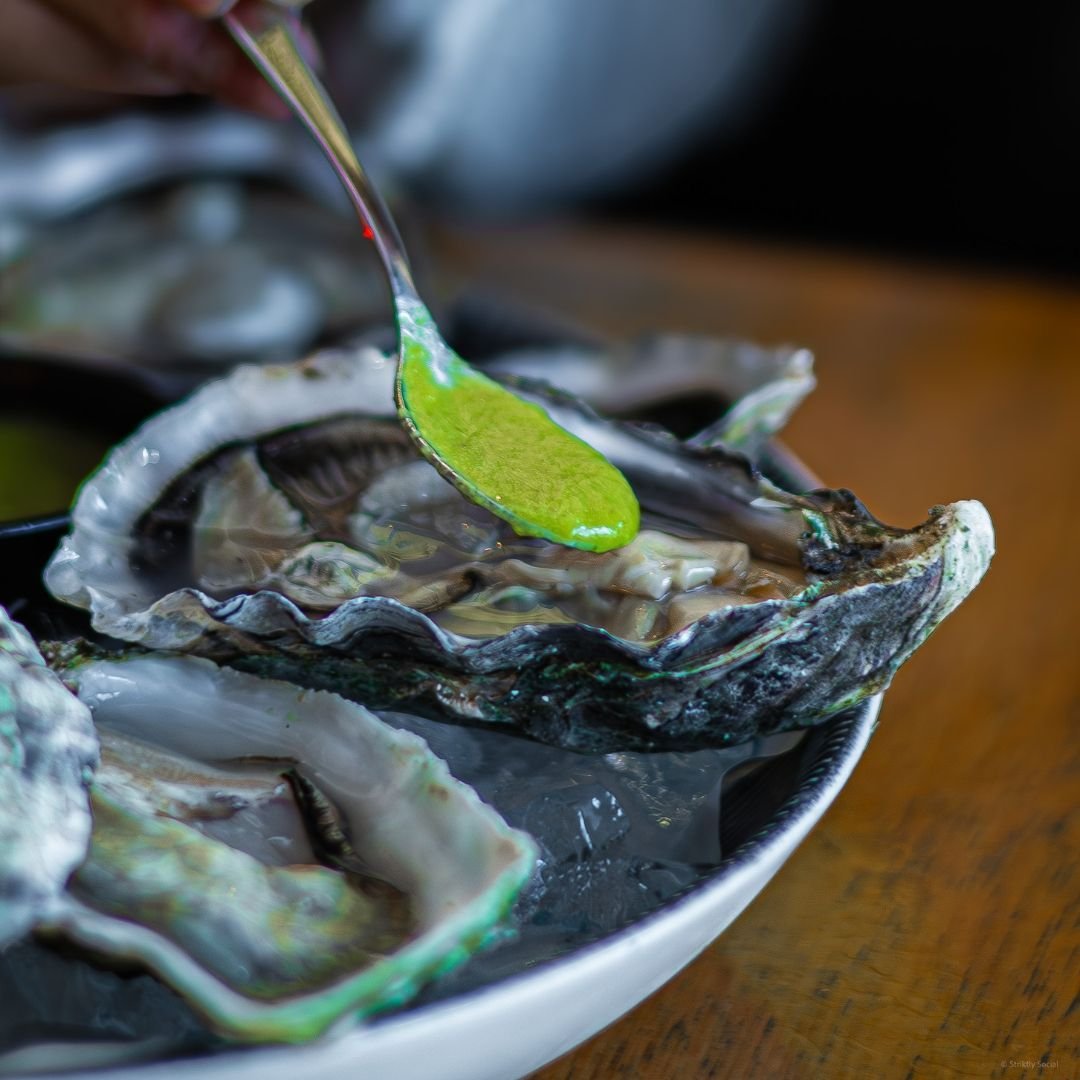 Dive into a fresh take on oysters at WOX! Our Gillardeau oysters are topped with a splash of cucumber coulis for that extra crisp kick. 🥒🦪

#gillardeauoysters #freshoysters #cucumbercoulis
#oysterlove #seafoodie #culinaryadventure
#freshflavors #se