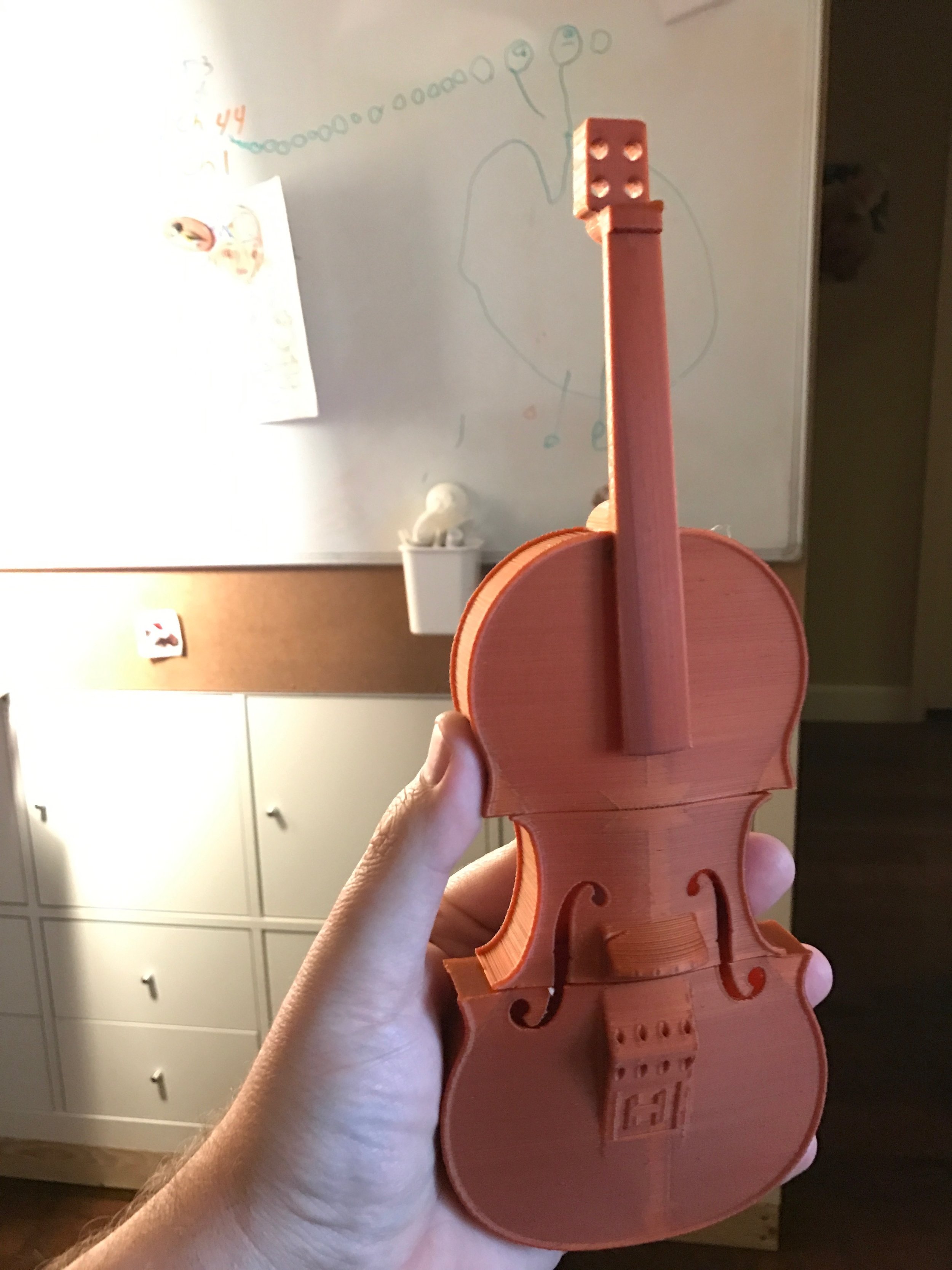 And after 6-7 hours, the 50% scale model is done! Penelope said "It's missing something" which would be the strings and tuners...