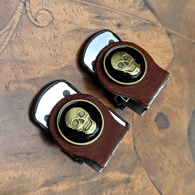 Deadly neat sleeves.  Die cast skulls outfitted on cognac leather.  We make every Sleeve Clip by hand, and all the pieces are customized specifically for our clips -- nothing is &quot;off the shelf.&quot; For instance, each piece of leather is cut wi
