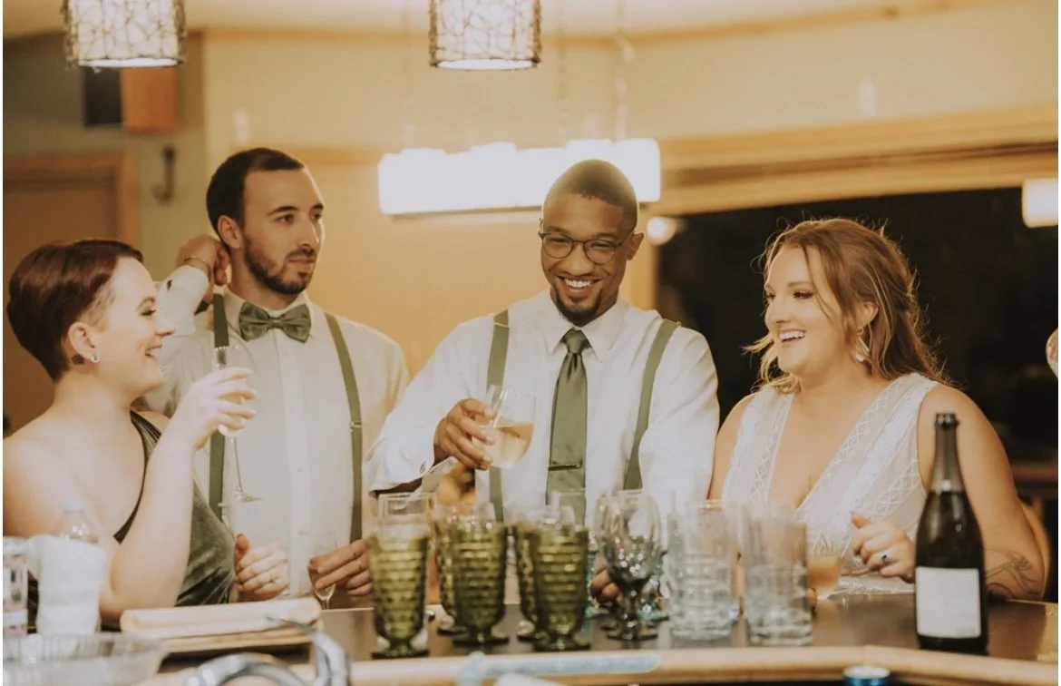 river-haven-wedding-toast-cheers.webp