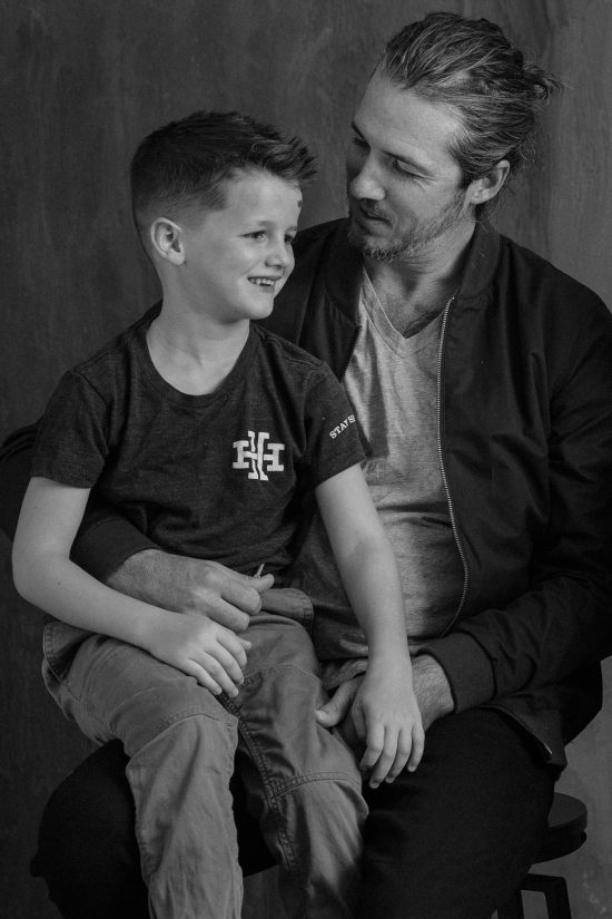 Paul Catlett with his son (Photo courtesy of Hudson Hawk Barber and Shop)
