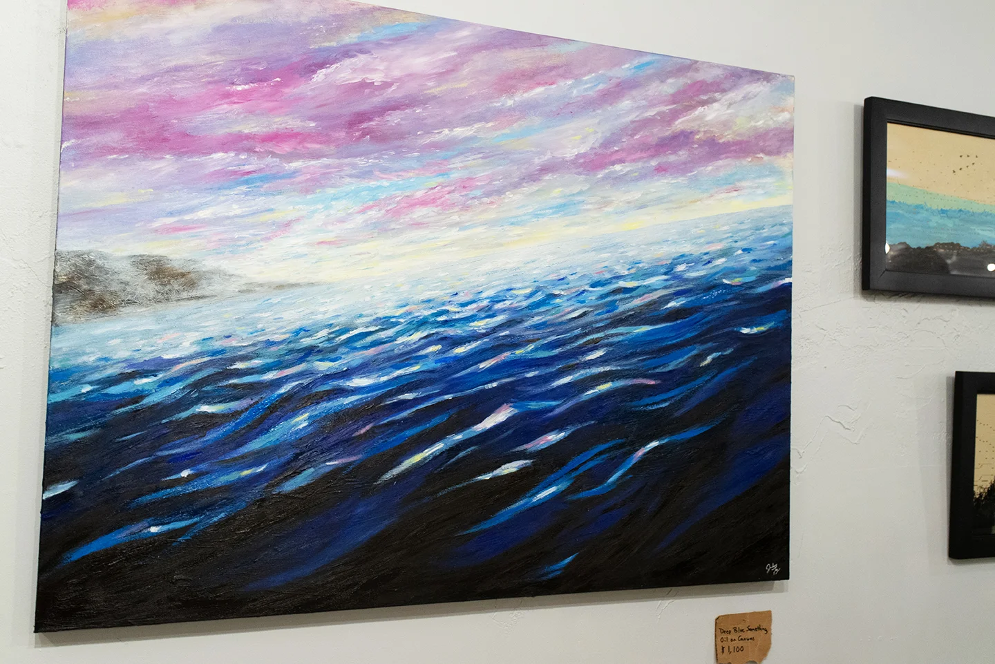 This painting started off with an orange sky and a swordfish. I didn’t like it and ended up painting over it all. I like to tell people there is a fish under the water. It’s true a fish really is under there, a stupid swordfish!