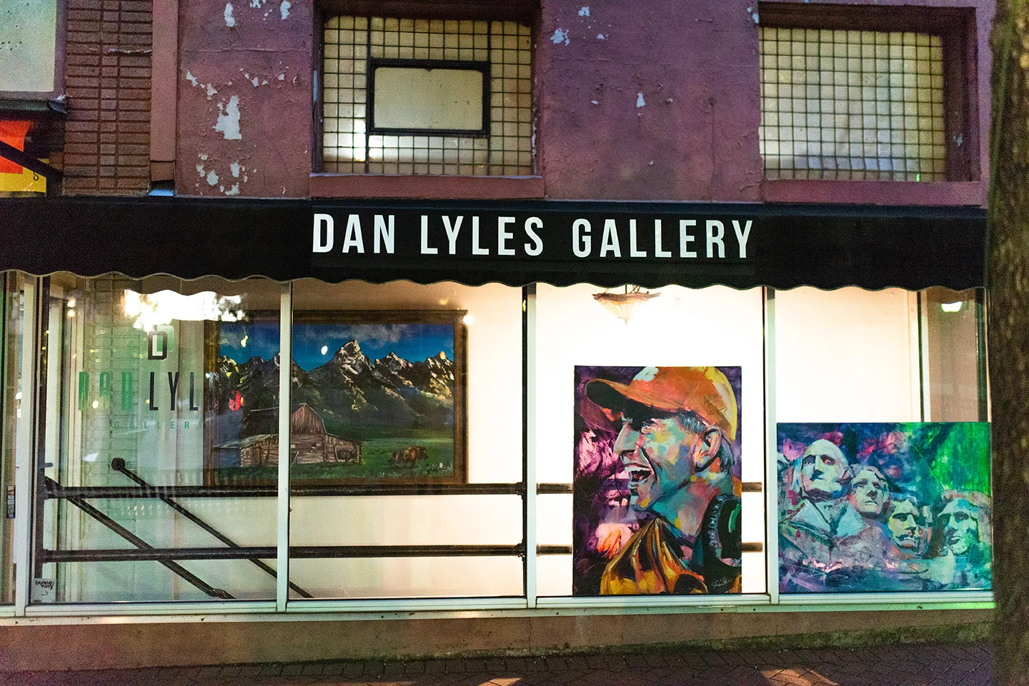 Currently Dan is getting spot lights and various artists/mediums hanging in this front, window space.