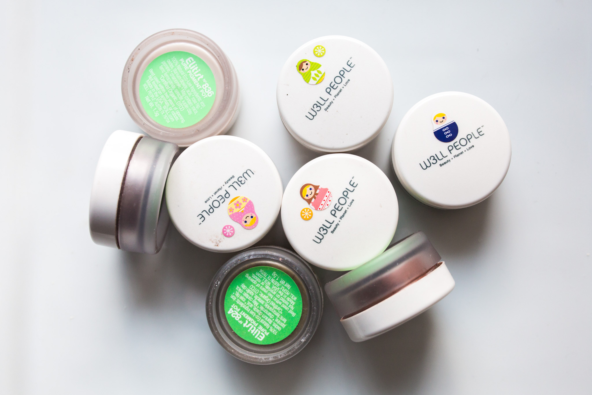 Tiny Japanese stickers help me identify the shades, though their new packaging solves the problem with windows in their caps.
