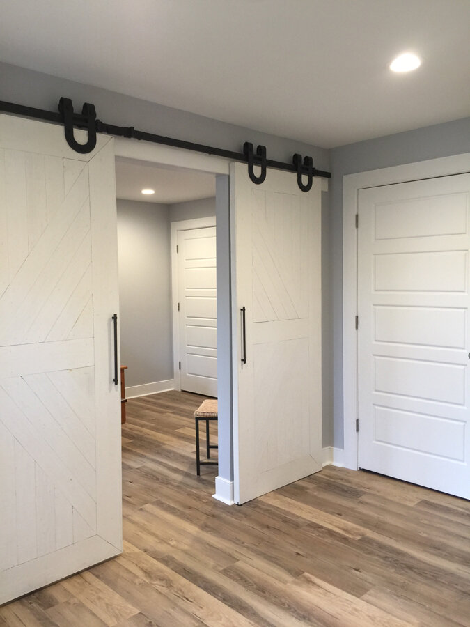 Finished Basement Guest Room by Halcyon Contracting