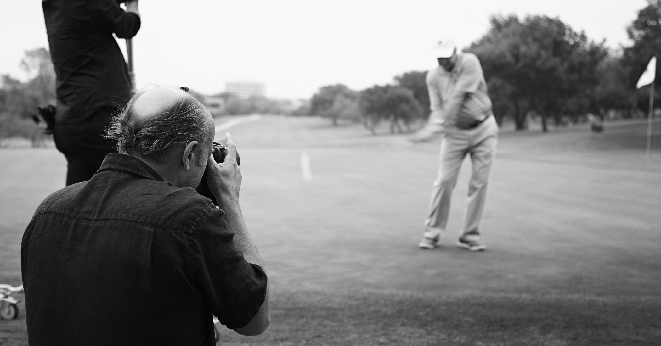 Andrew photographing President George W Bush for Golf Digest