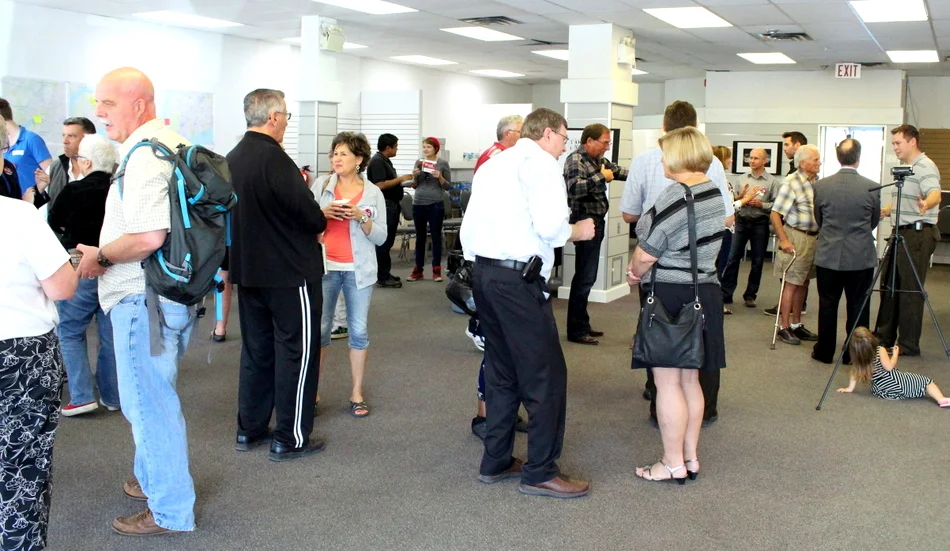 The crowd enjoys the morning, and some post-speech refreshments.&nbsp;