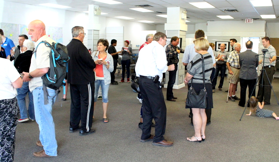 The crowd enjoys the morning, and some post-speech refreshments. 