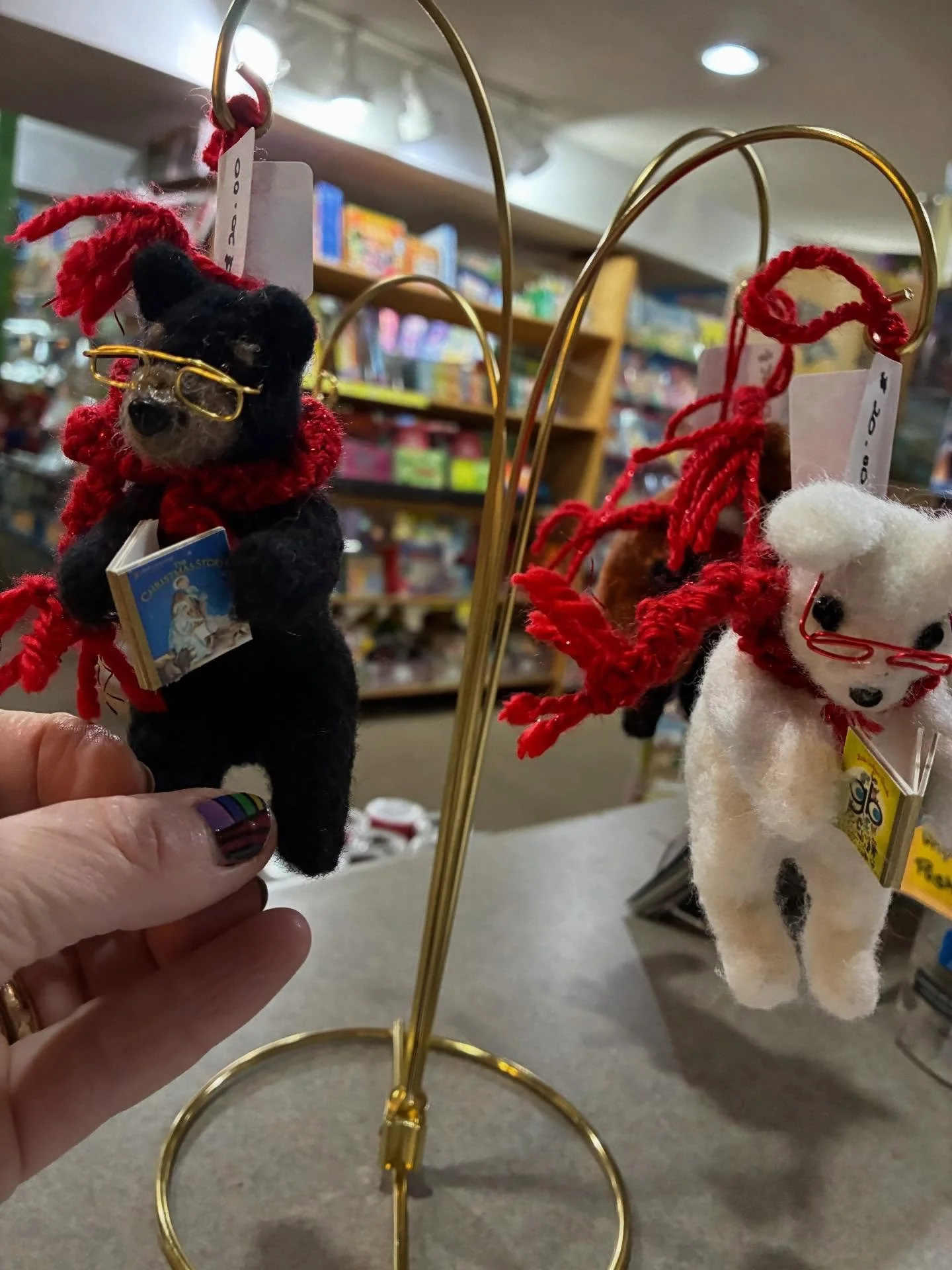 We have some of my reading creature ornaments at @bearpondbooks_stowevt ! $20.00, handmade by me (my husband makes the glasses). More each week. 

#christmas #ornaments #felting #stowe #stowevermont