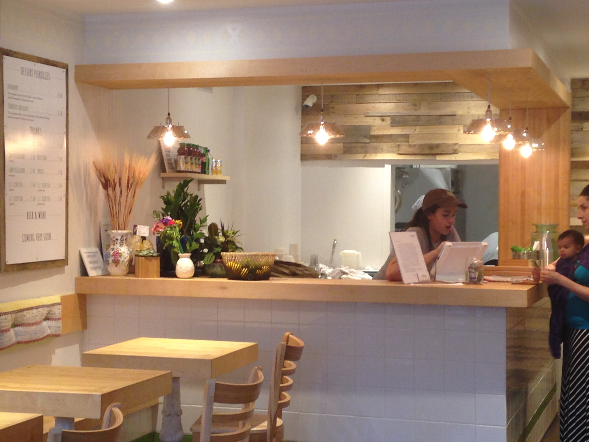 From the counter where you order, you can peer into the kitchen in the back, where dough is rolled and pierogies are being shaped and filled by hand. 