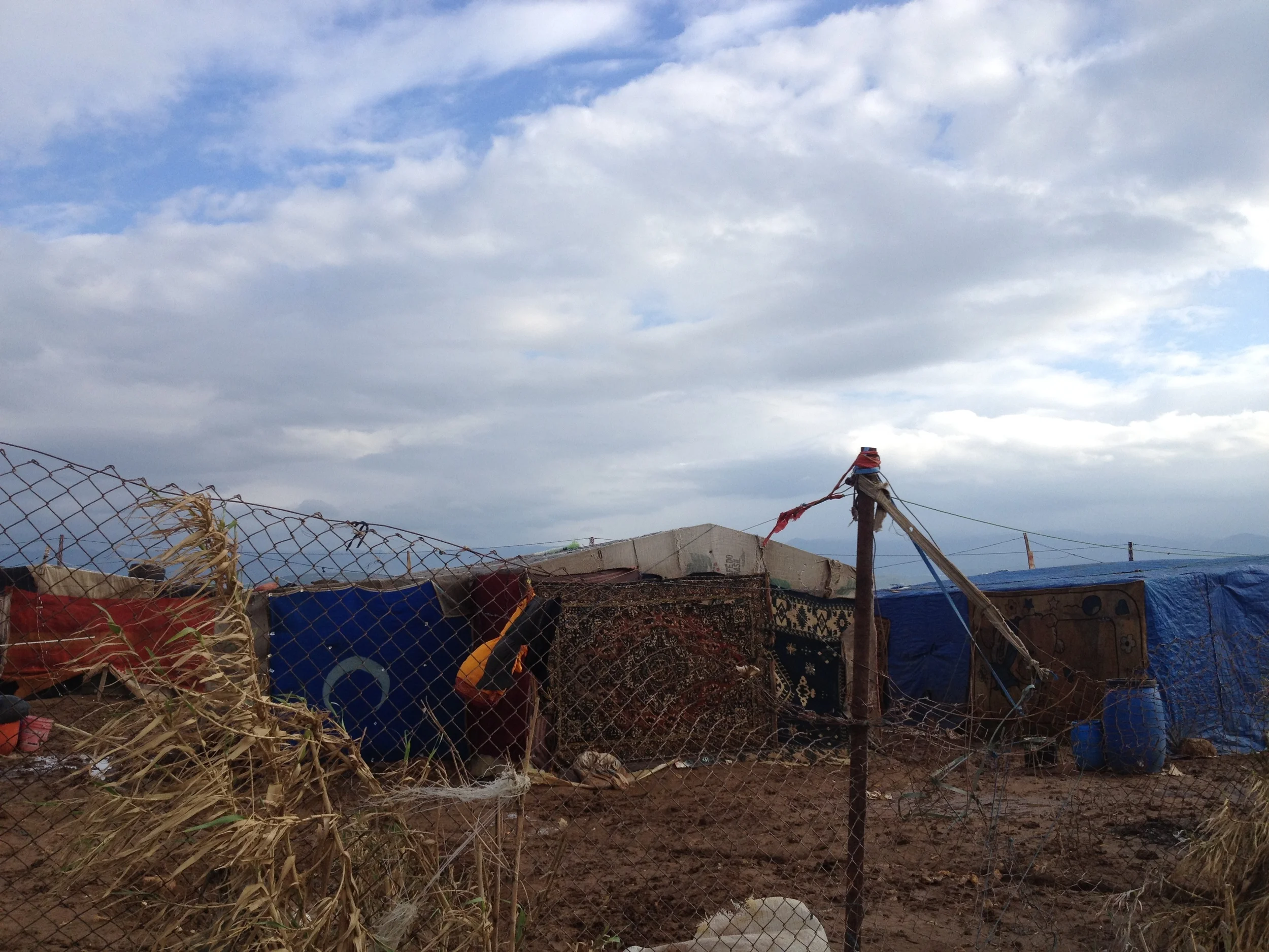 Informal refugee camp next to the Syrian border. 'Akkar (North Lebanon), 2013. Photo taken by Estella Carpi.