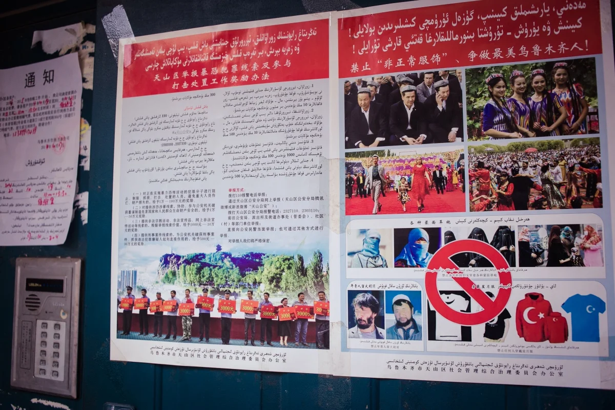 Signs posted throughout Uyghur sections of the city.