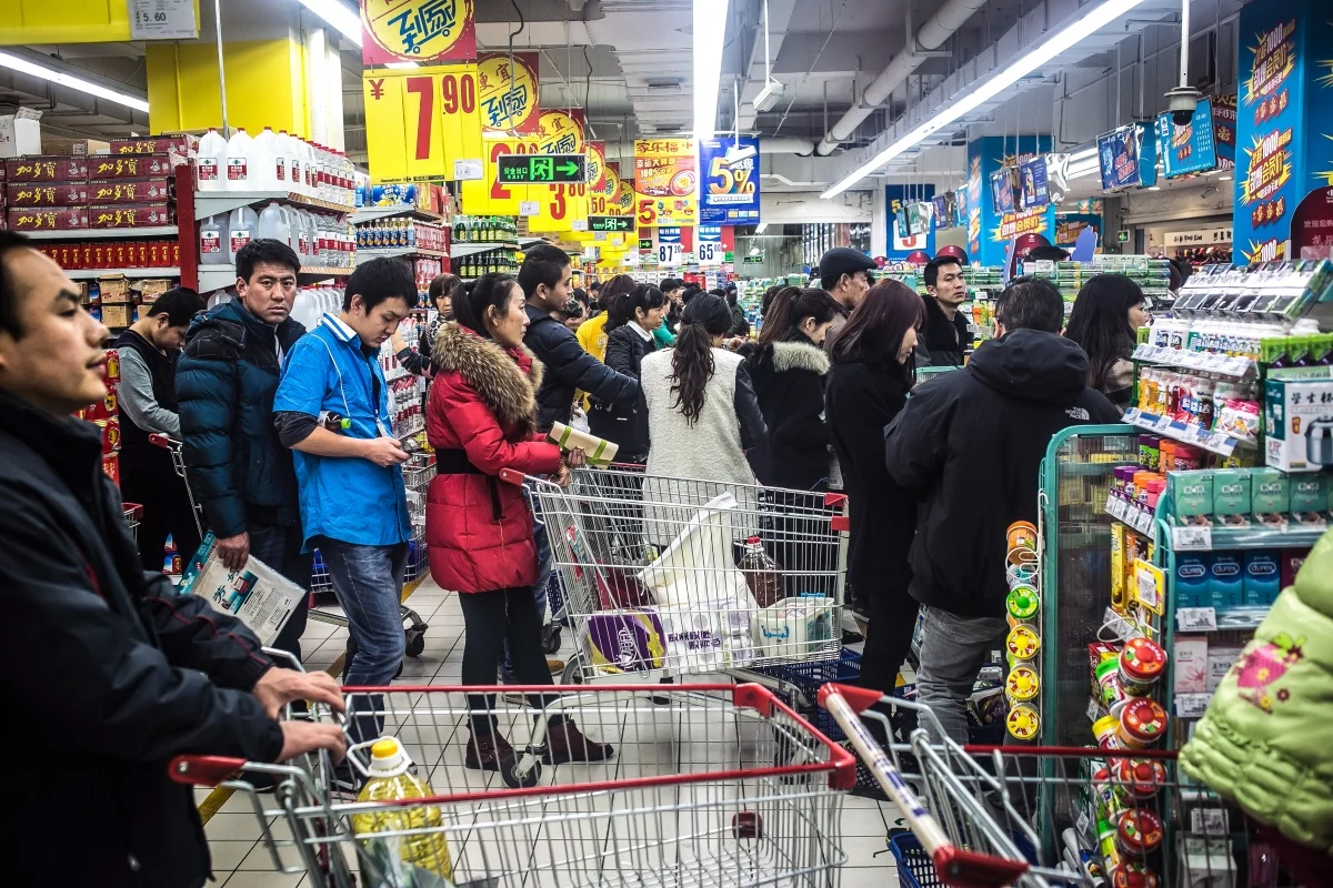 Uyghur and Han shoppers at the local Carrefour supermarket.