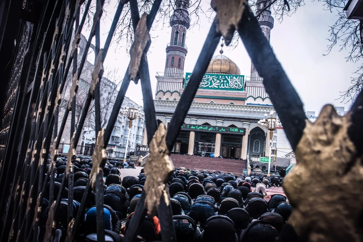Uyghur men gather to pray on a Friday in 2014.