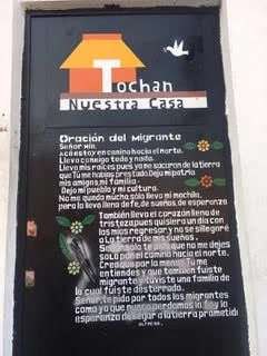 Prayer of migrants. Photo credits: Carly Miller.