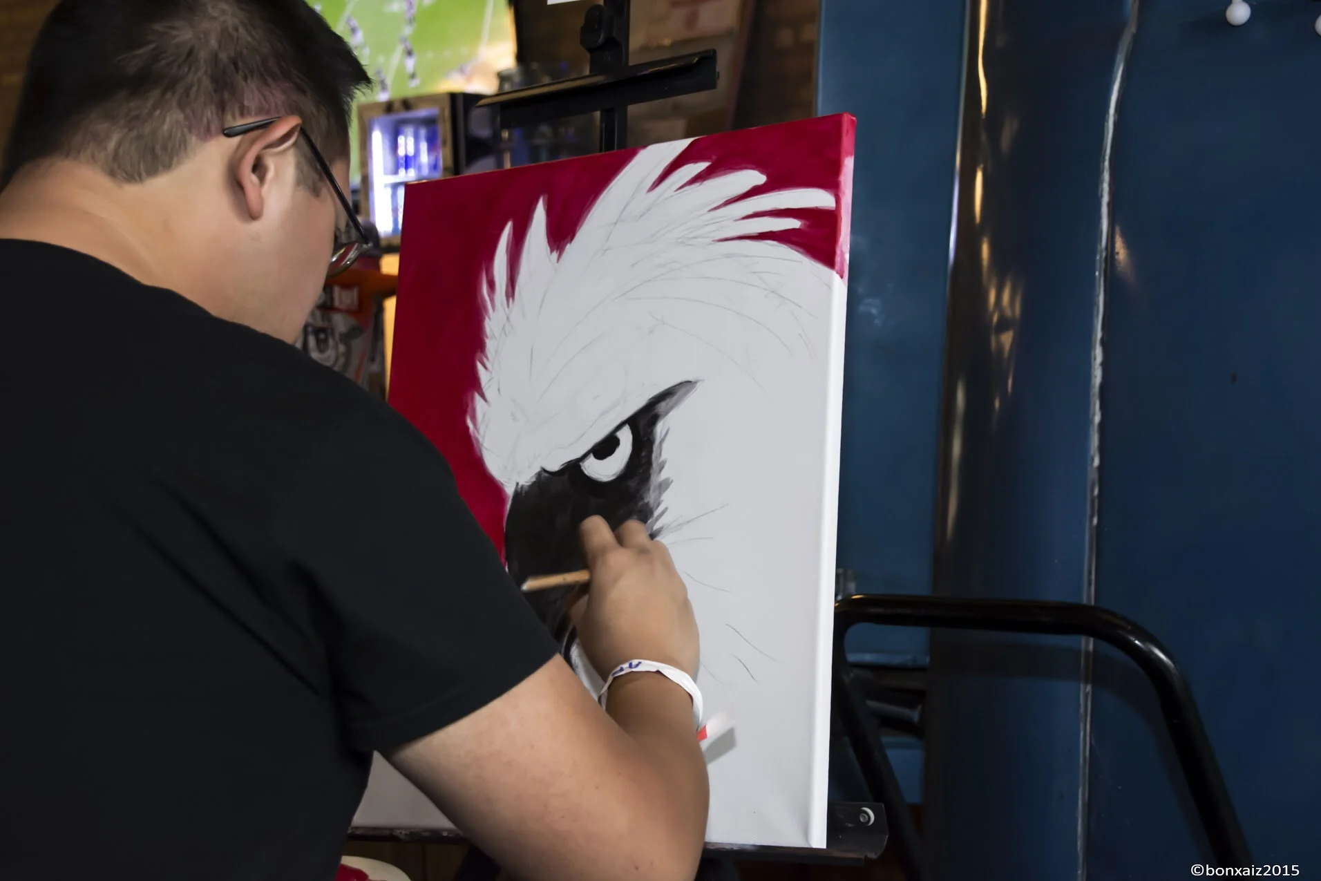  Painter Chris Gallevo sold two of the works he created on-the-spot. Photo credit: Gen Odon