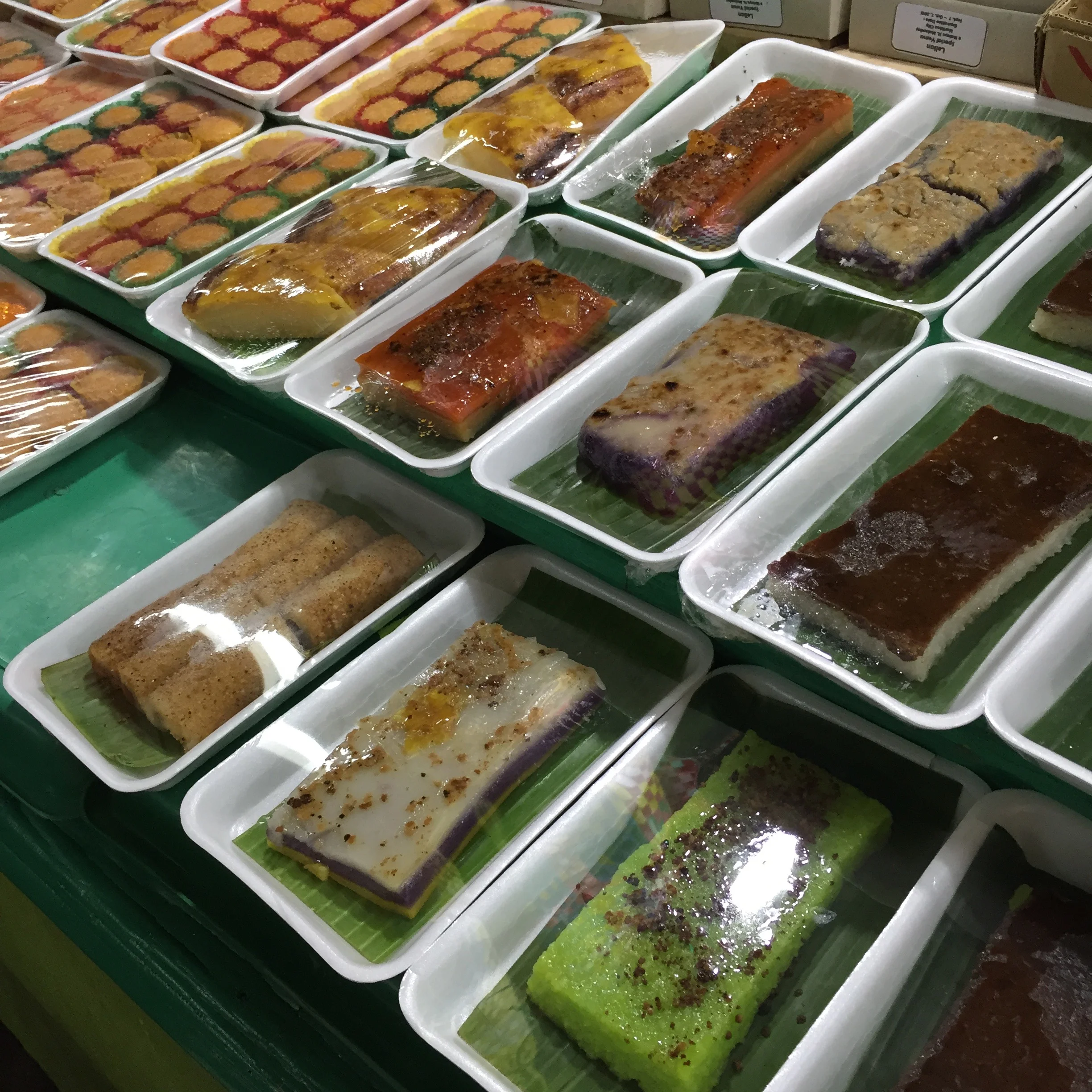 Typical rice cakes at a kalinderya (cafeteria) – Cubao, Manila