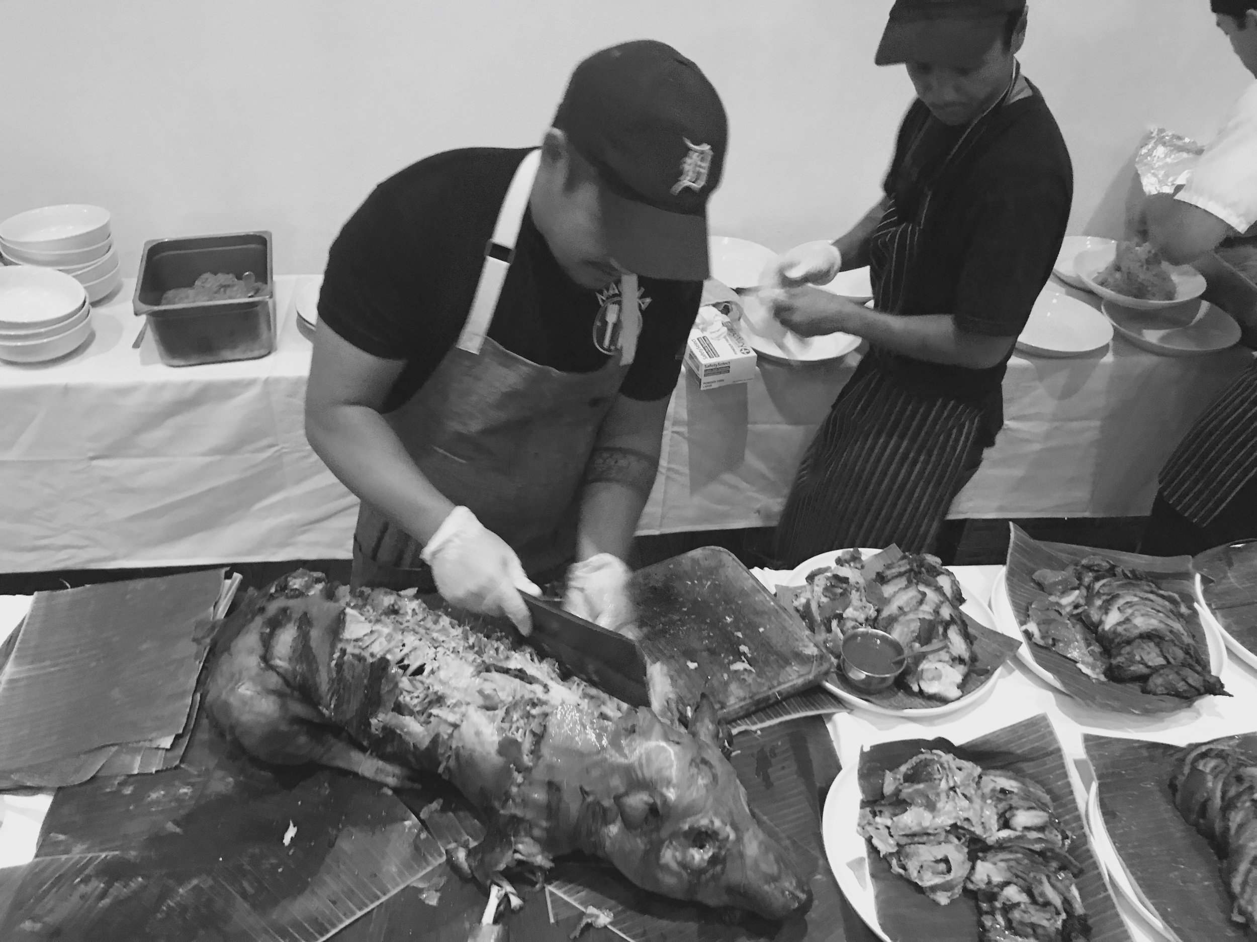 Chef Lamagna portions the lechon.