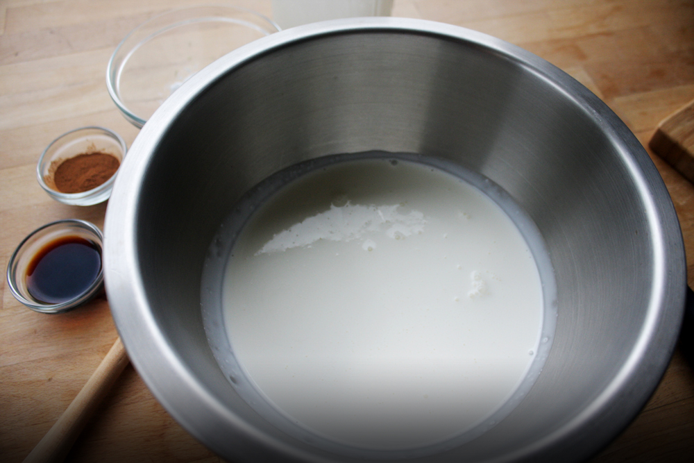   In a large bowl, pour in the whipping cream. I'm gonna apologize ahead of time for not photographing the whipping motion, but I poured in more cream than intended and it took 3 of us to get it to firm up. Meaning I advise you use an electric hand m