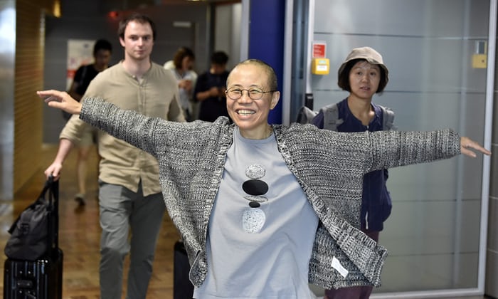  Liu Xia, the widow of Chinese Nobel peace prize-winning political dissident Liu Xiaobo, arrives in Europe. Photograph: Lehtikuva/Reuters 