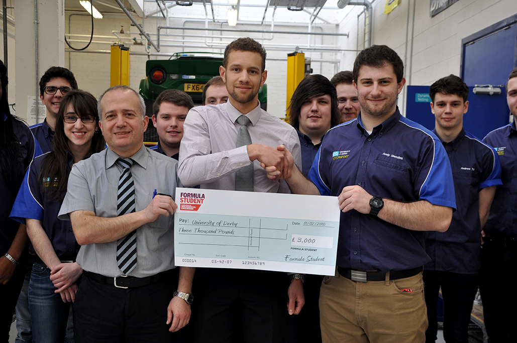 From left to right: Ilias Oraifige (Deputy Head of Department - Mechanical and Manufacturing Engineers), Fabian Welford-Tuitt (IMechE), Andrew Menzies (Team Leader, Team Derby Motorsport)