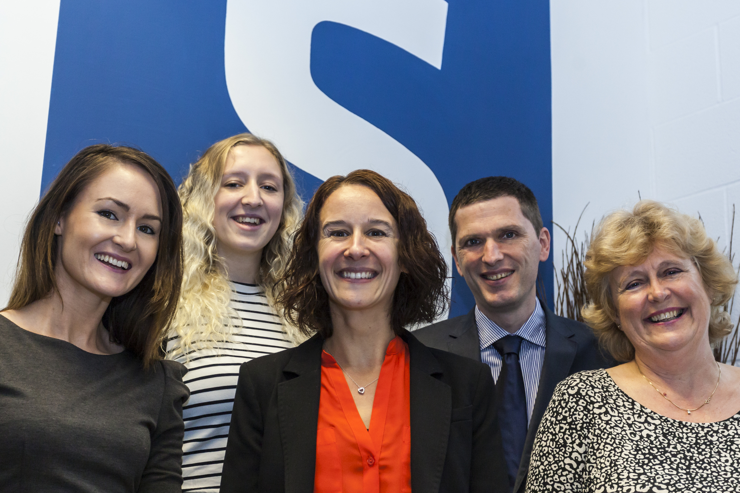 Smiles all round the team at Status Social