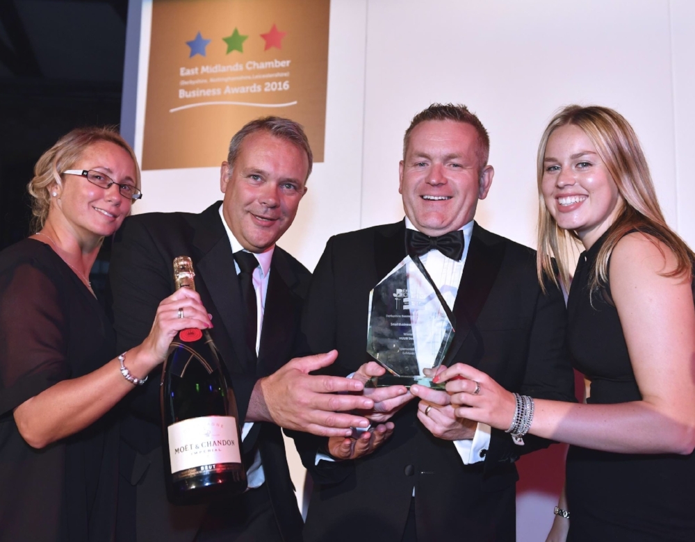 HUUB Design CEO, Dean Jackson, receives the (joint) Business of the Year accolade at the East Midlands Chamber Derbyshire 2016 Awards