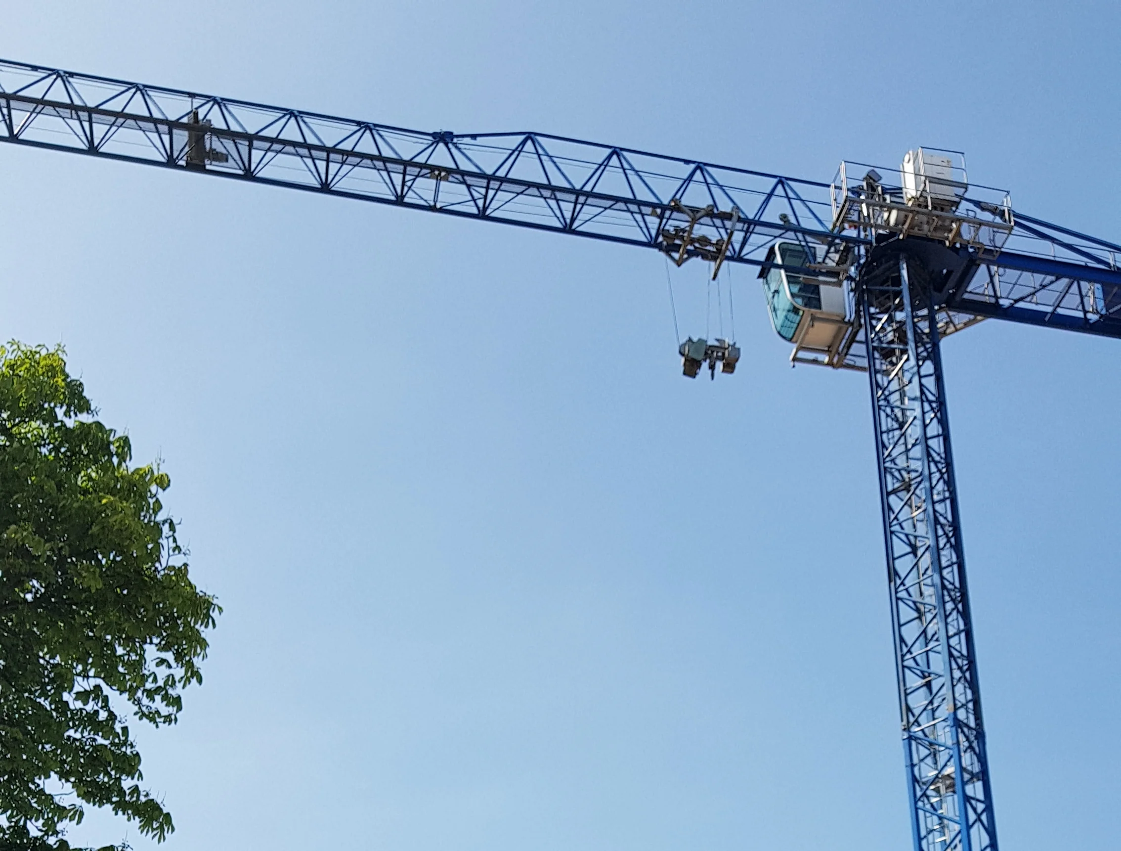 Crane hangs high over the site.