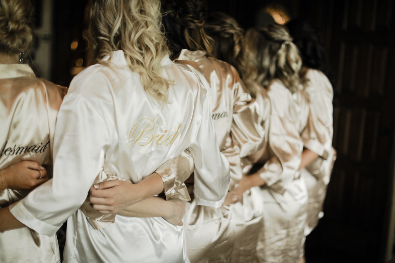 bride and bridesmaids getting ready