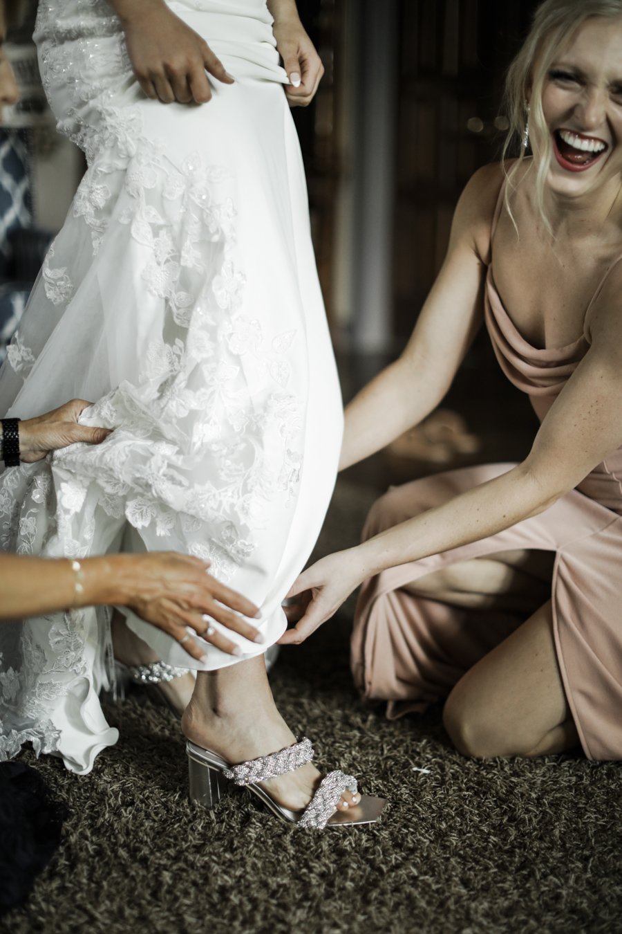 bride and bridesmaids getting ready