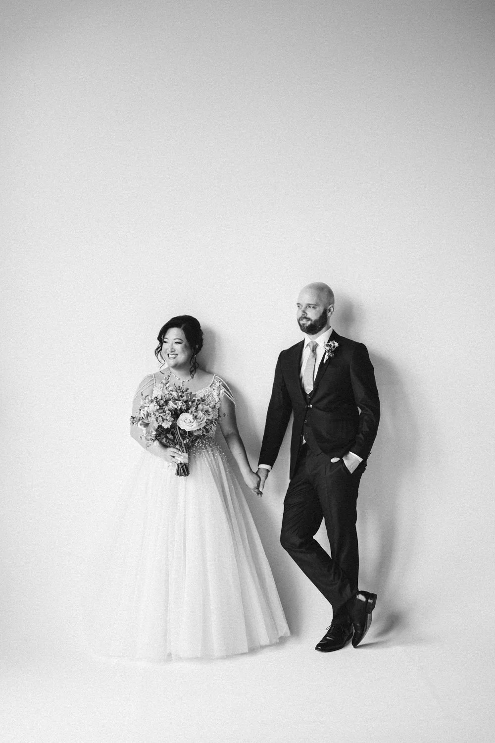 Wedding day studio portraits bride groom