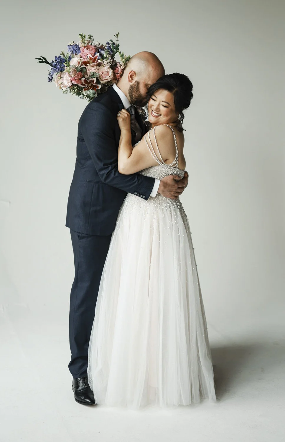 bride in studio on her wedding day photography session