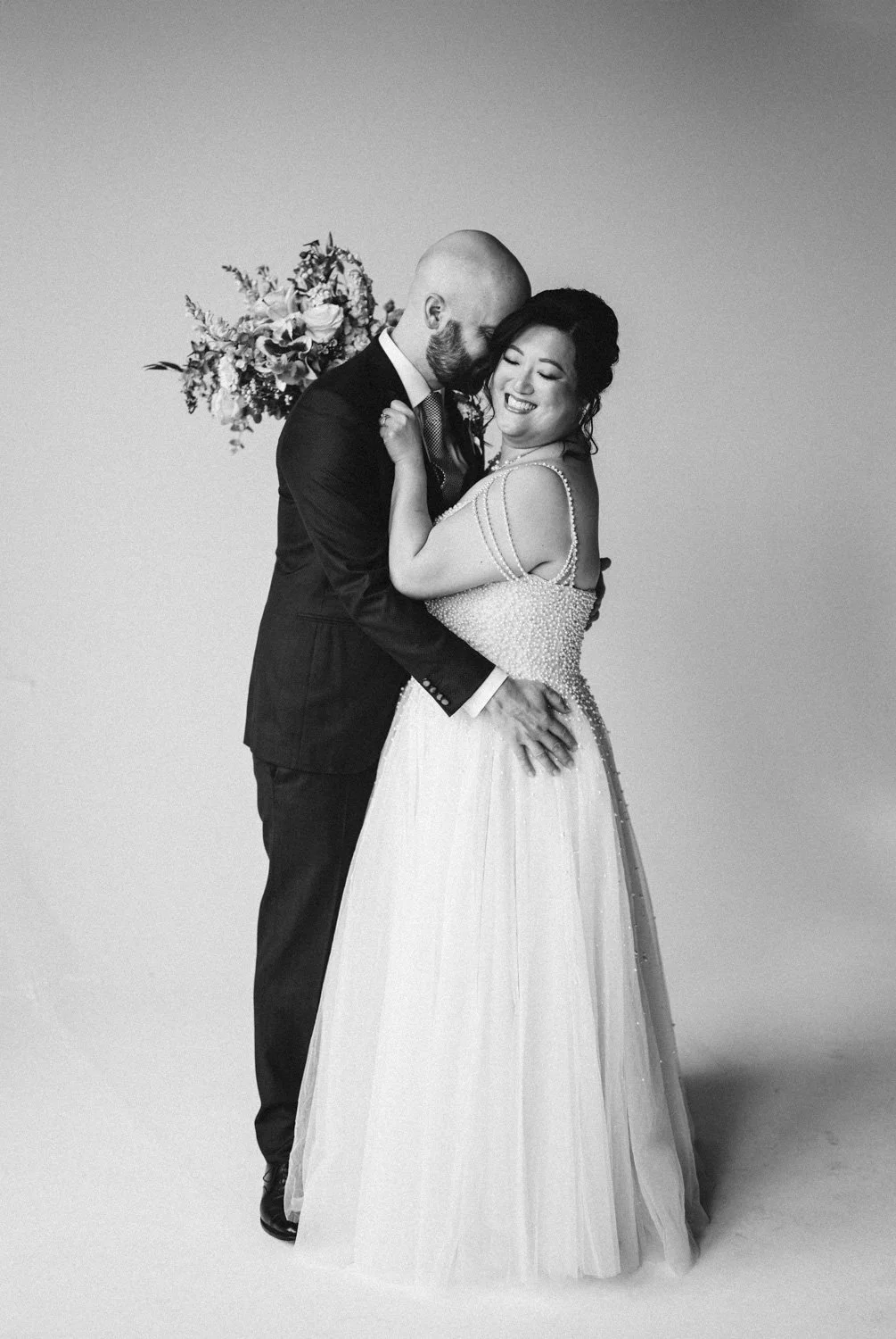 bride in studio on her wedding day photography session