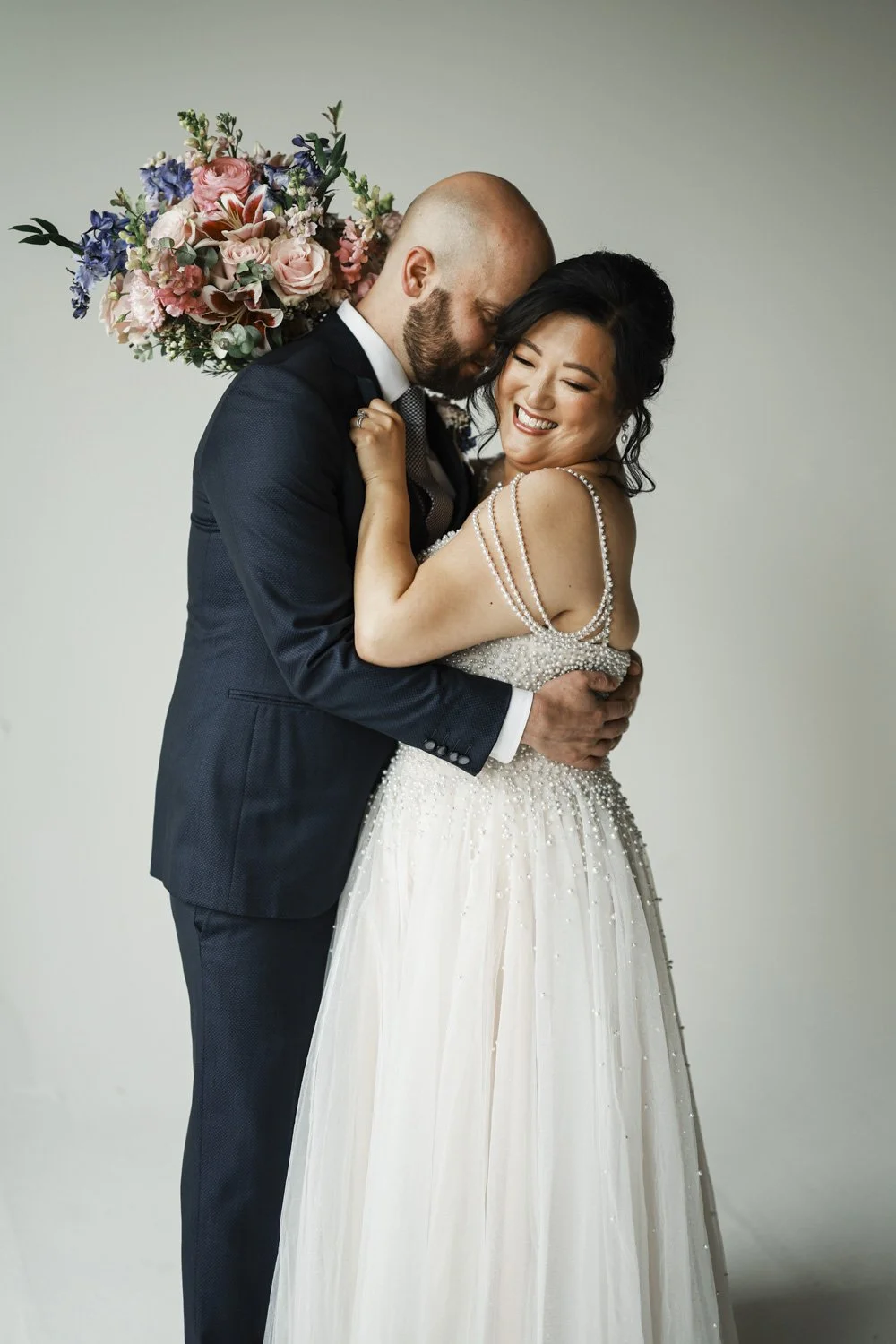 bride in studio on her wedding day photography session