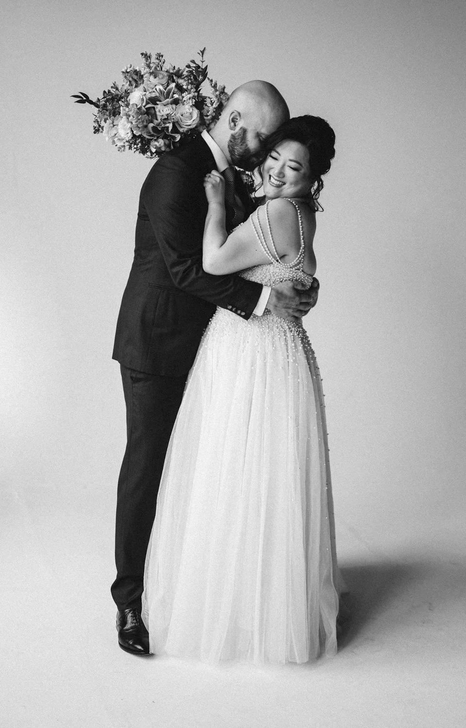 bride in studio on her wedding day photography session