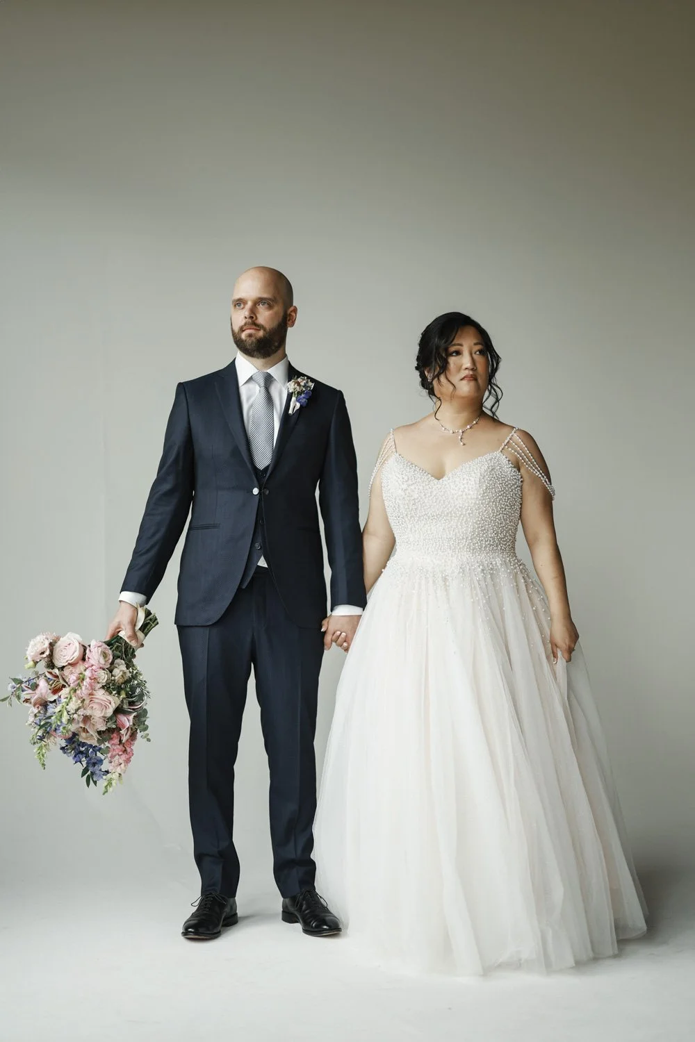bride in studio on her wedding day photography session