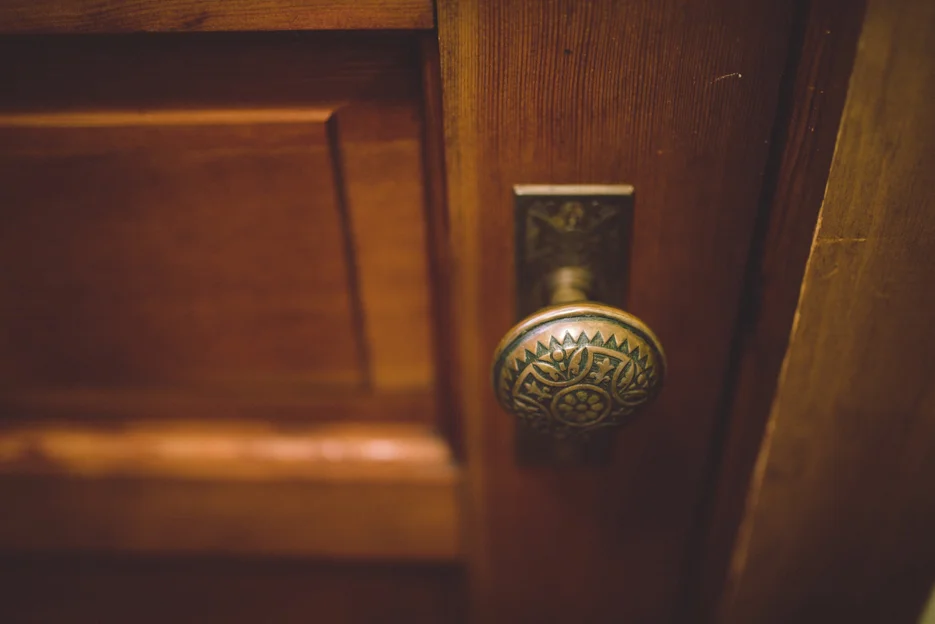 The inside door handle to the front door: a gateway to awaiting adventures.