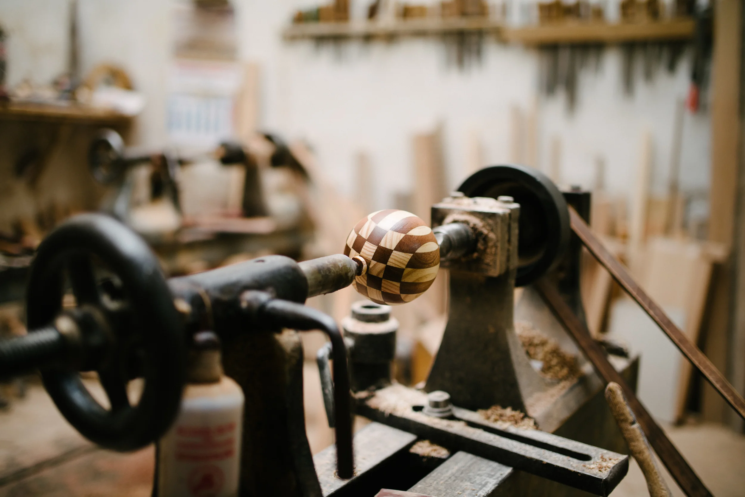 In Louis' workshop. His tools and the smell of lacquer caught my attention from the street; he kindly welcomed us inside to look around.
