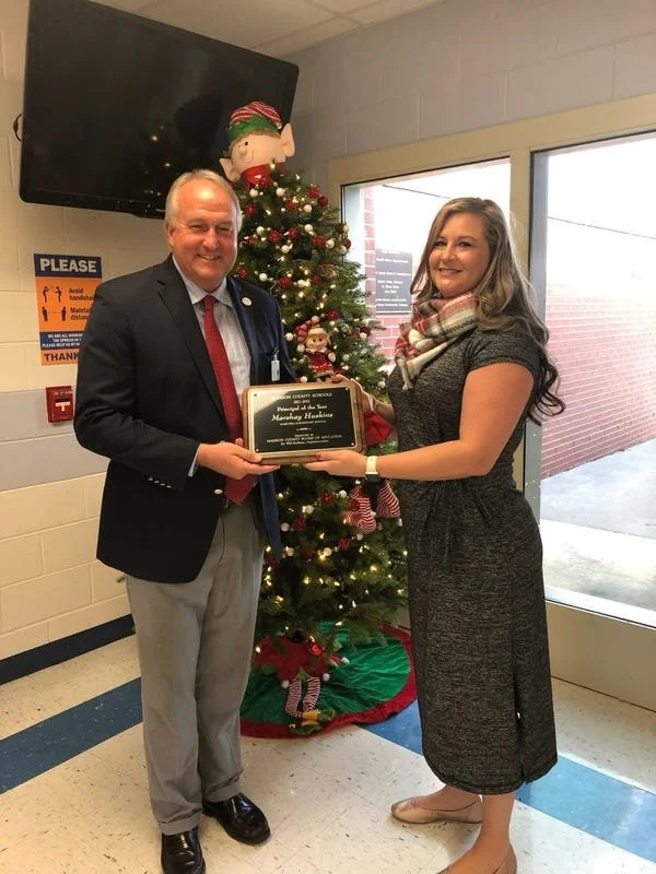 Madison County School honored Bonner alum as principal of the year  at school board meeting