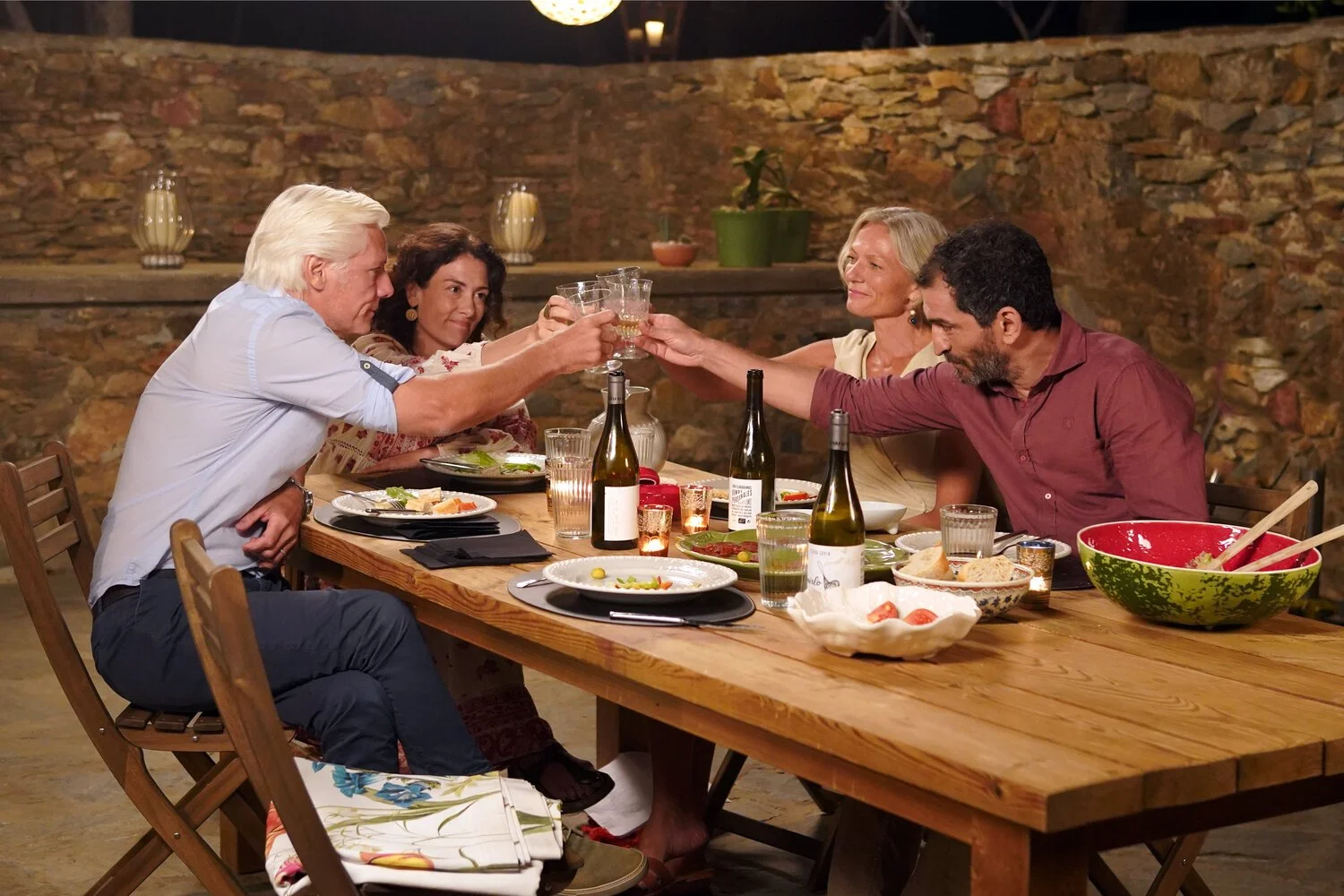 4 Friends toast at table.jpg