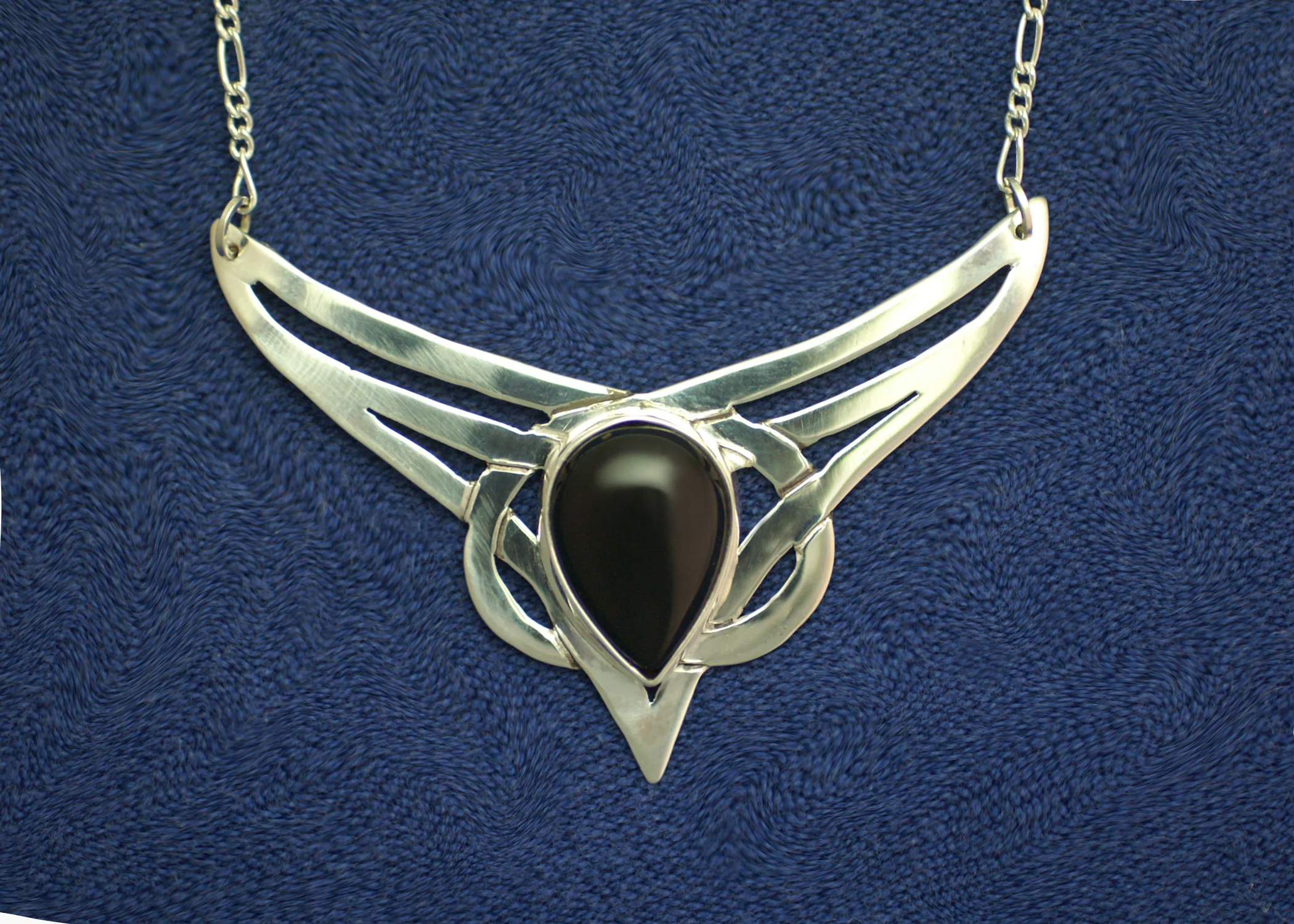 #5002. Celtic Nouveau. $195. Black Onyx 