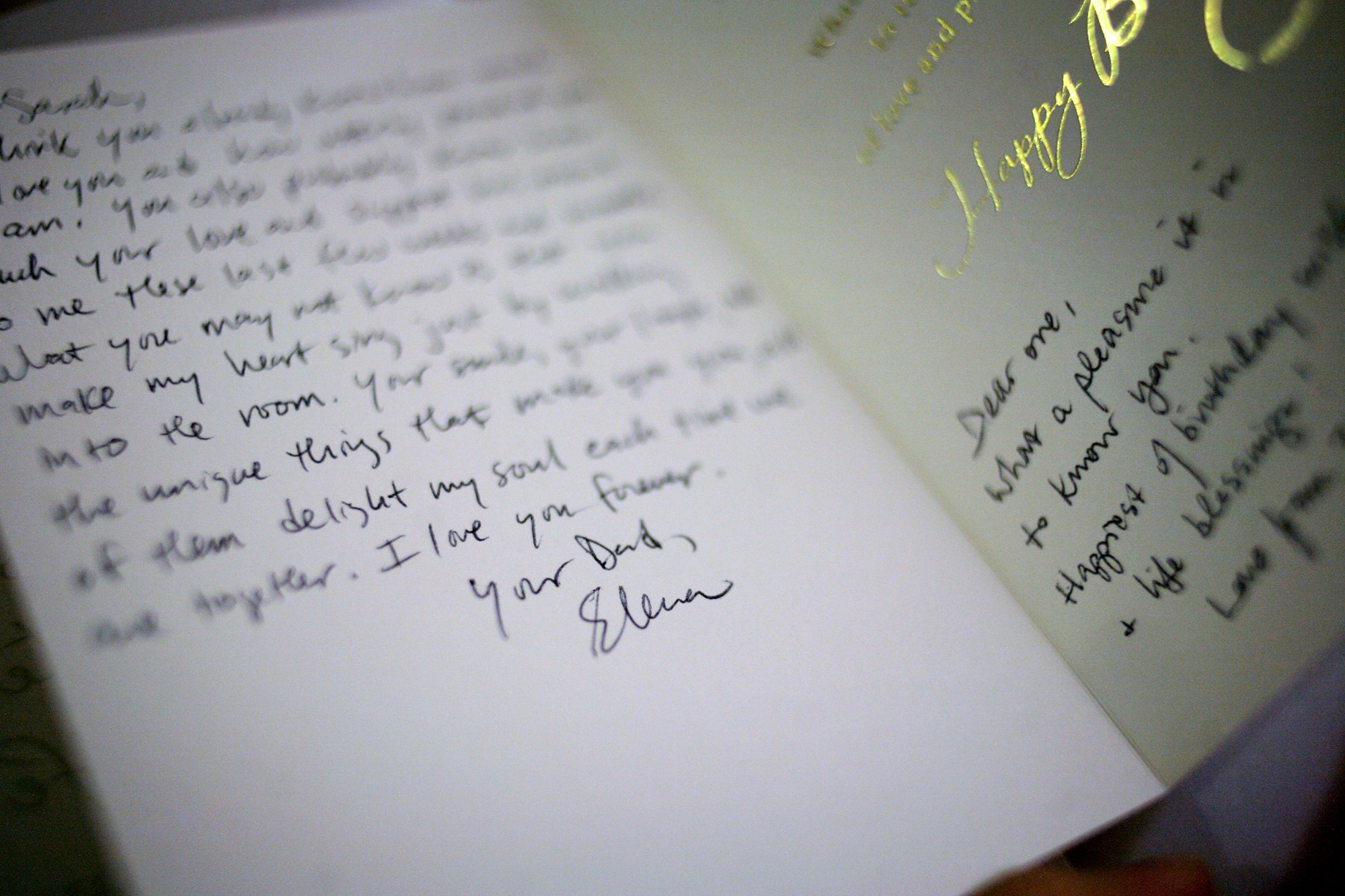 Elena finishes writing a card to her oldest daughter, Sarah, for her 26th birthday. She sees herself as a woman, but understands she still plays the role of a father in the lives of her children. While in daily life it irks her when others refer to her as "sir" or "mister," she still welcomes the male terminology of "dad." "I am their father, there's nothing I can do to change that," she says. "There's no reason to change it."