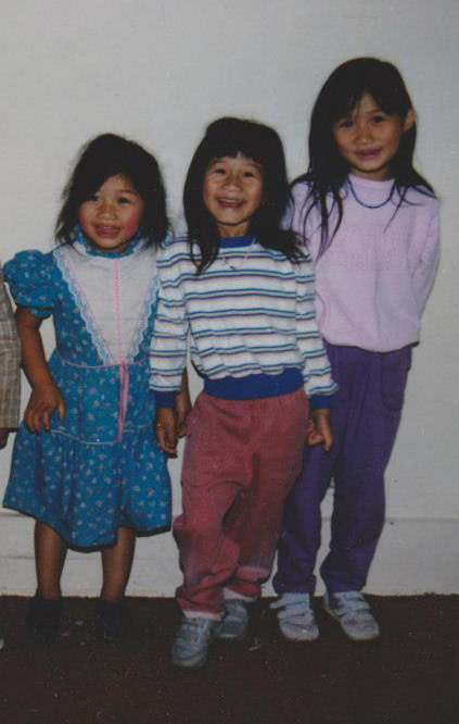 Me (left) with my super cute first-generation older sisters. 1990s.