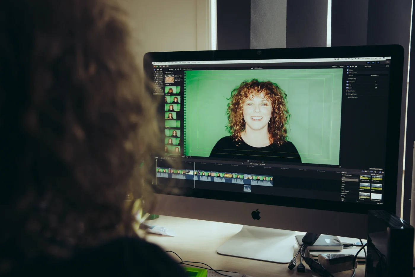 Bindi editing videos for her Youtube channel