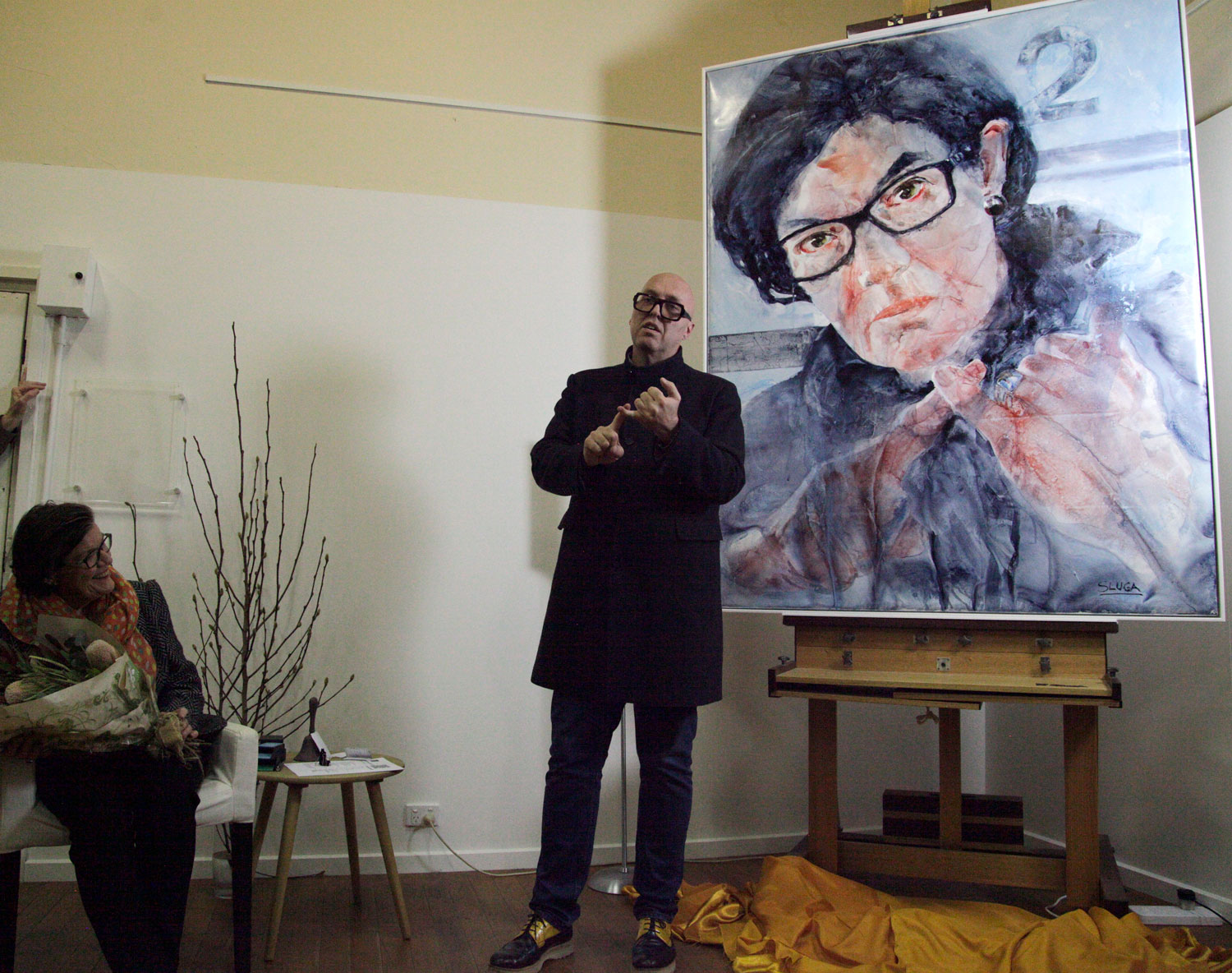 Explaining the painting and process