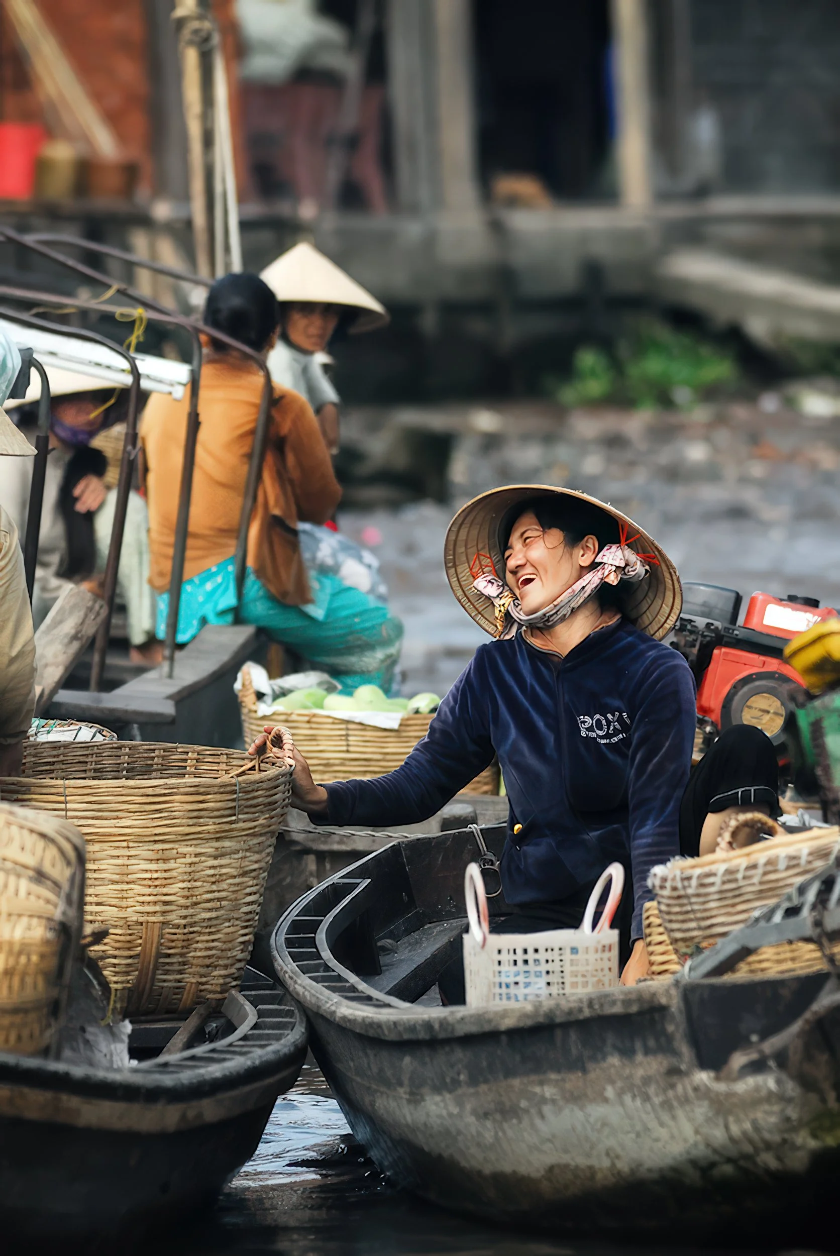 floating-market-vendor-laughing-mekong-delta-vietnam-lifestyle.jpg