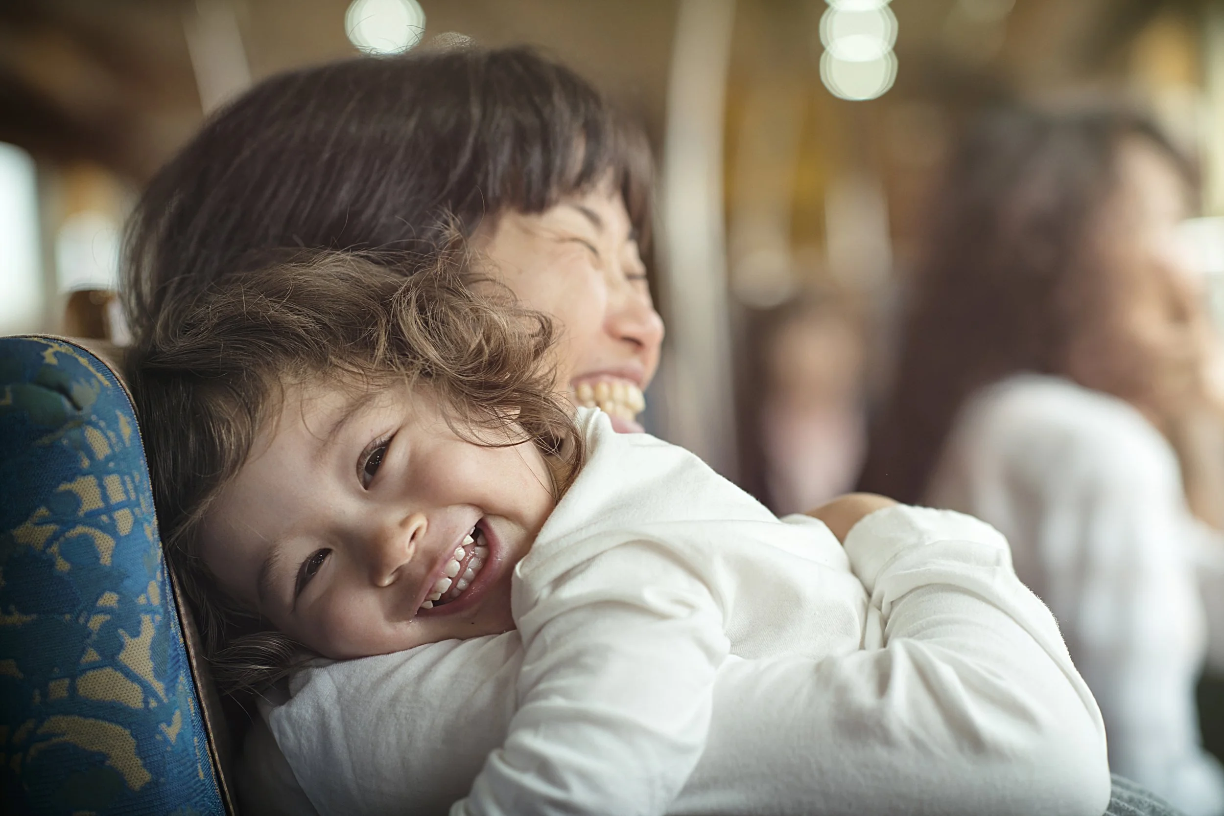 japan-kyushu-train-mother-and-child-hug-amazon-prime-commercial-photography.jpg