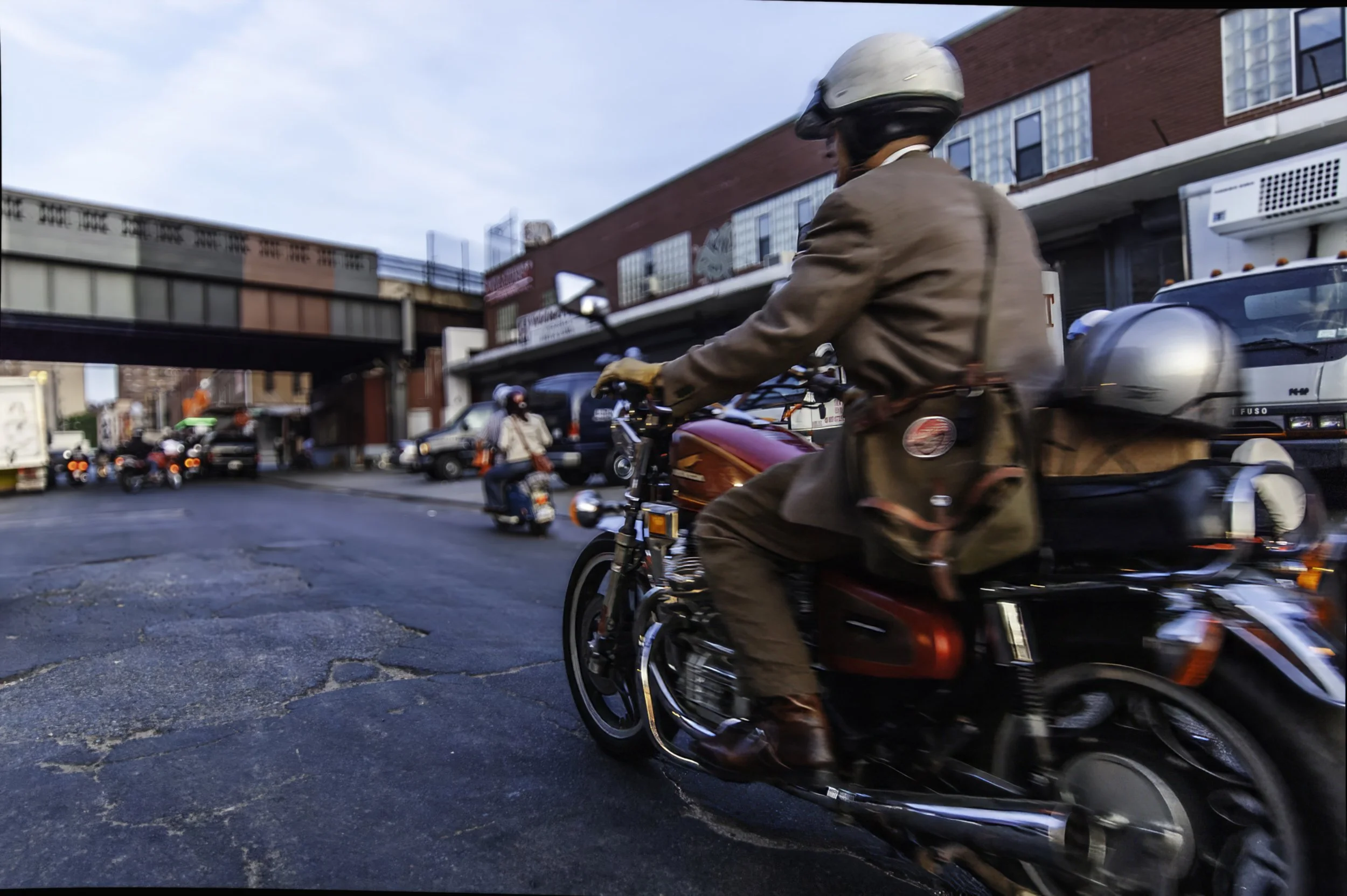motorcycle-rider-nyc-street-motion-blur-urban-scene.jpg