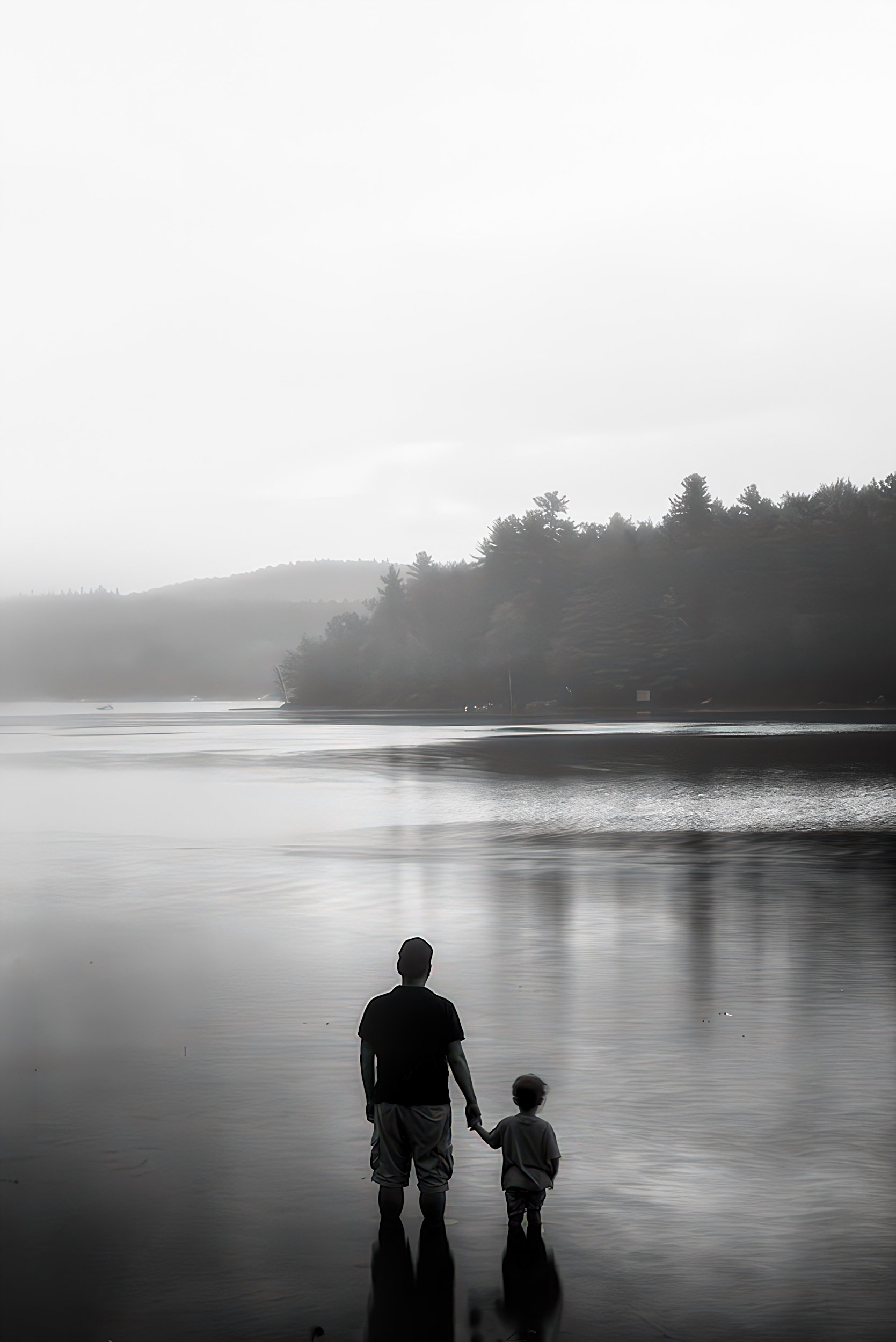 father-child-lake-silhouette-misty-morning-reflection.jpg